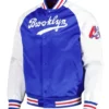 Inspired by: Team Brooklyn Dodgers Material: Satin Color: White and royal blue Inner lining: Viscose lining Collar: Stand up collar Closure: Buttoned closure Sleeves: Full length Cuffs: Rib knitted cuffs Pockets: Two waist pockets Worn by both genders Fine stitching